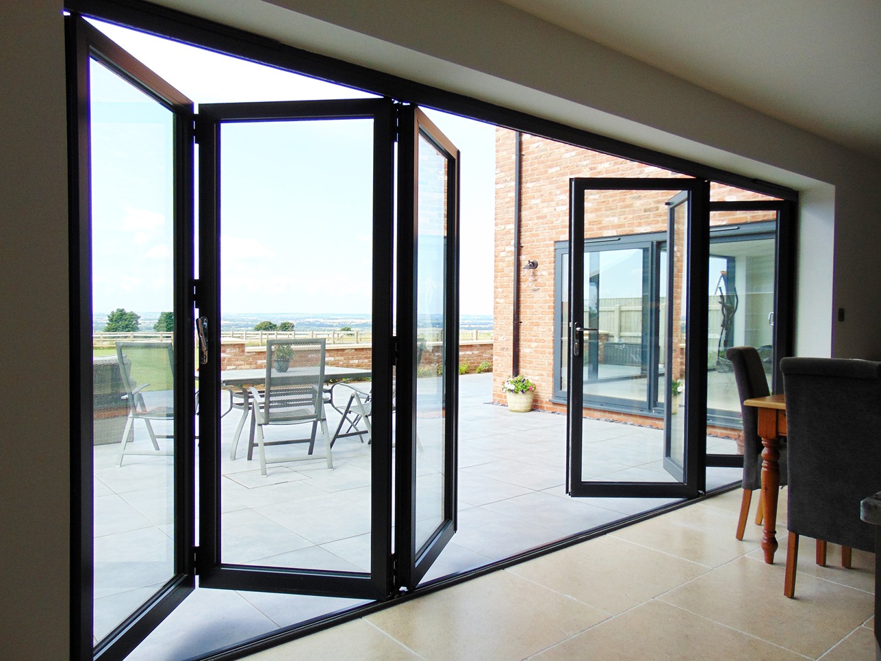 Low Price Thermal Break Double Tempered Glass Aluminium Arch Folding Patio Doors